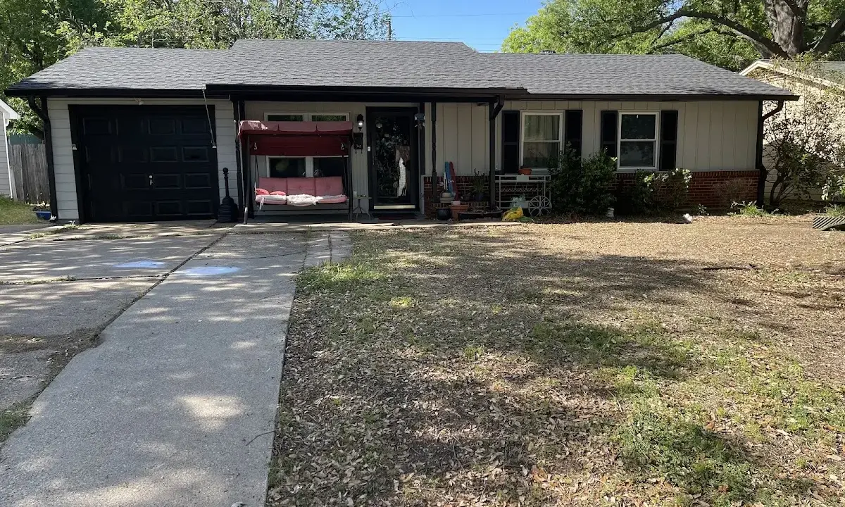 Asphalt Shingle Roof Repair crew at work on a residential roof in Jackson